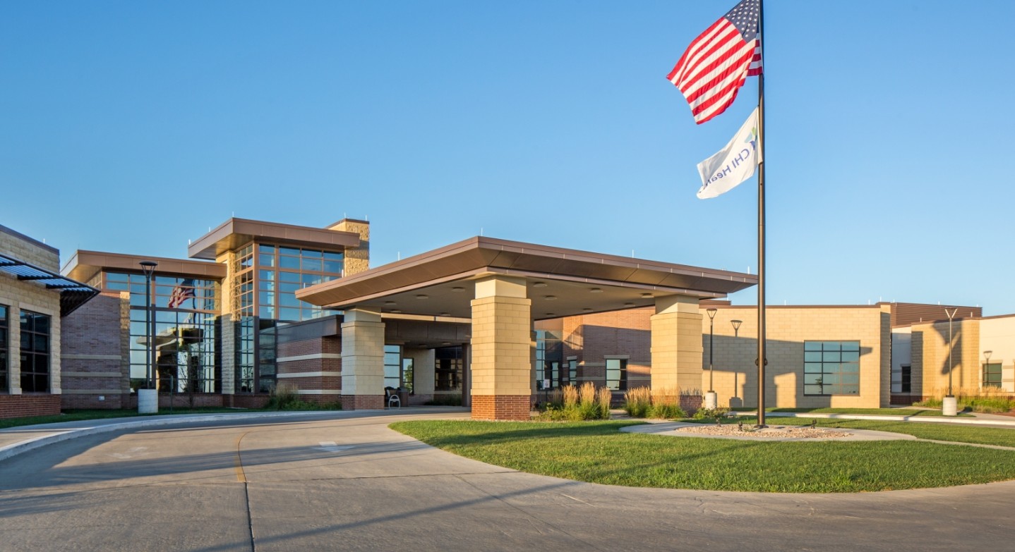 Front entrance and drive-under awning with stone pillars of CHI Health St. Mary’s in Nebraska City, Nebraska